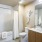 apartment bathroom with full size bath tub
